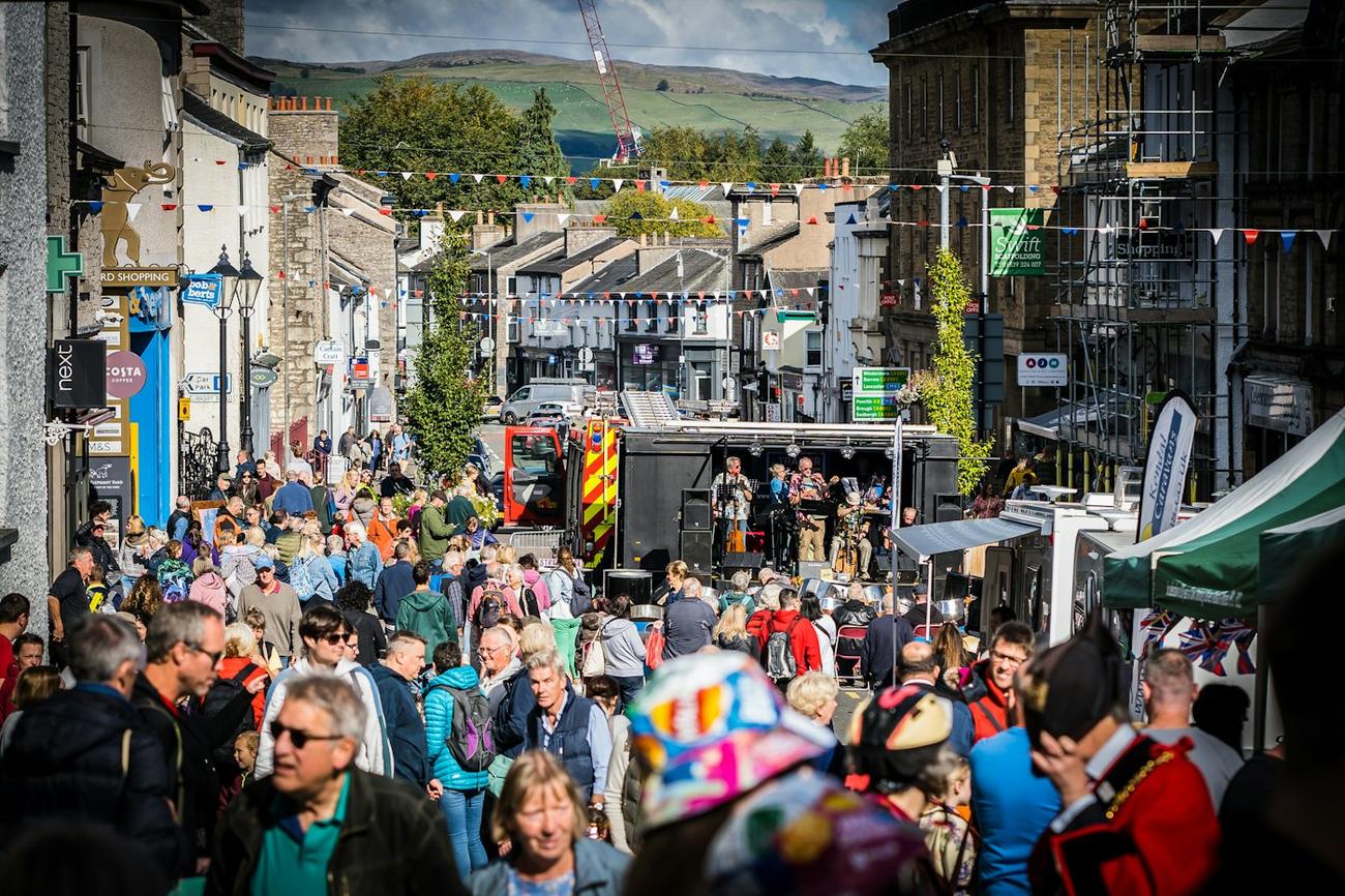 A crowded town centre street event